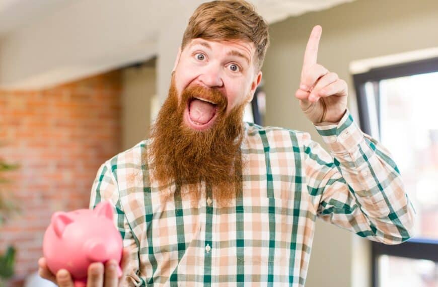 Red hair man feeling like a happy and excited genius after realizing