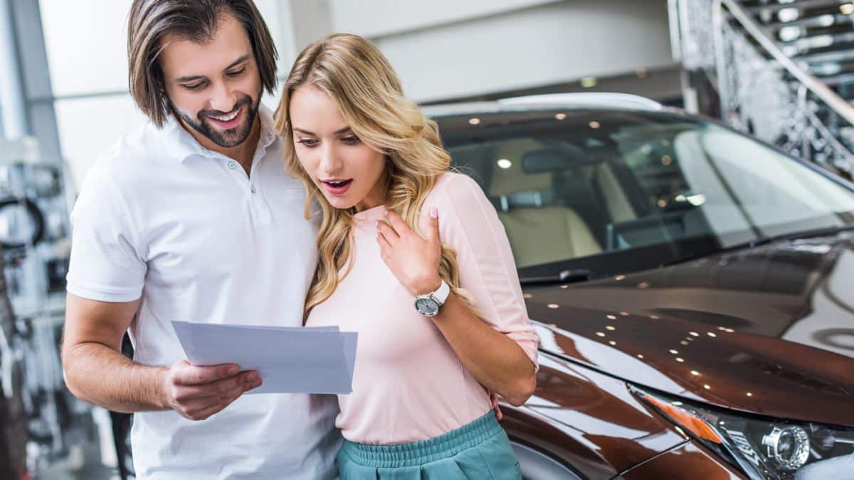 couple buying a car