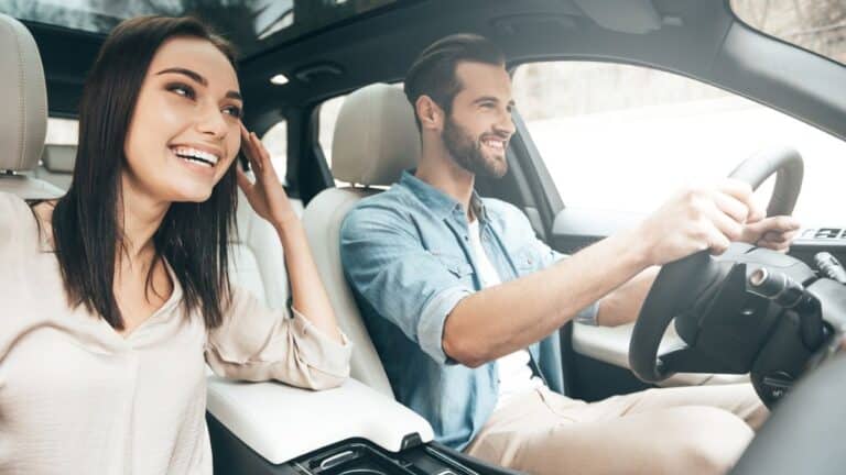 couple driving a car