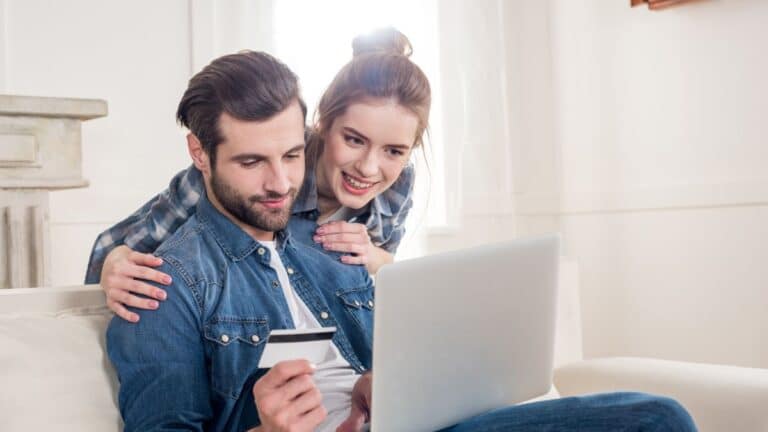 couple making an online purchase with a credit card