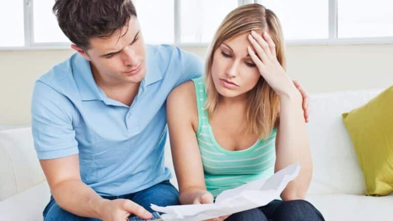 couple upset sad bills