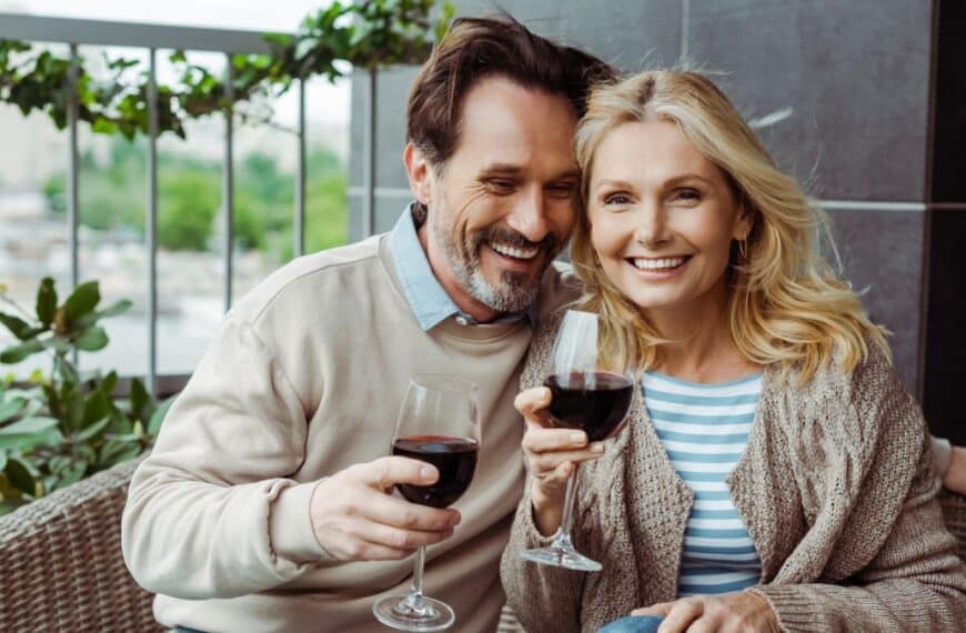 elder couple drinking wine