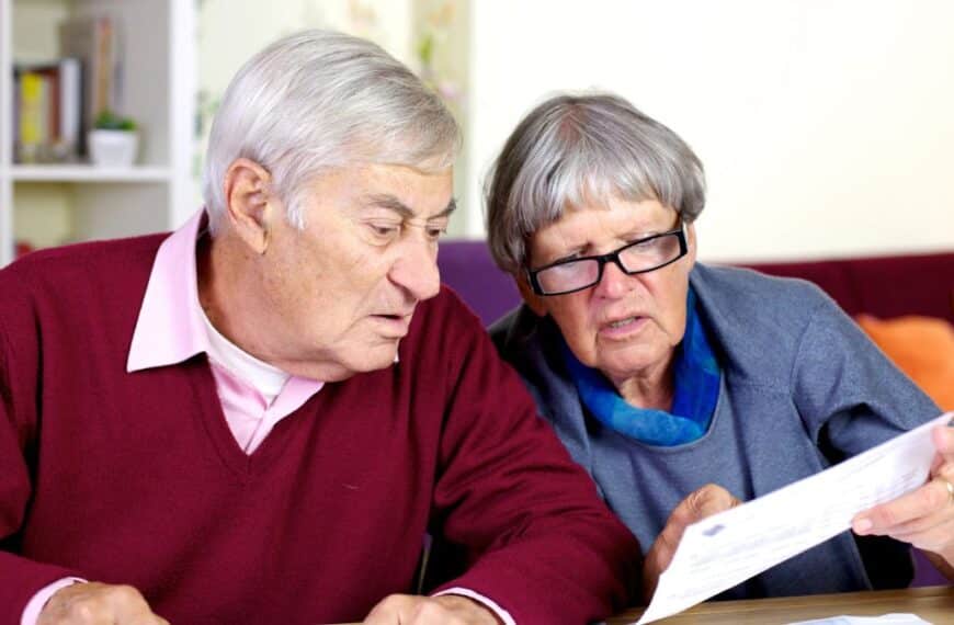 elder couple reviewing finances