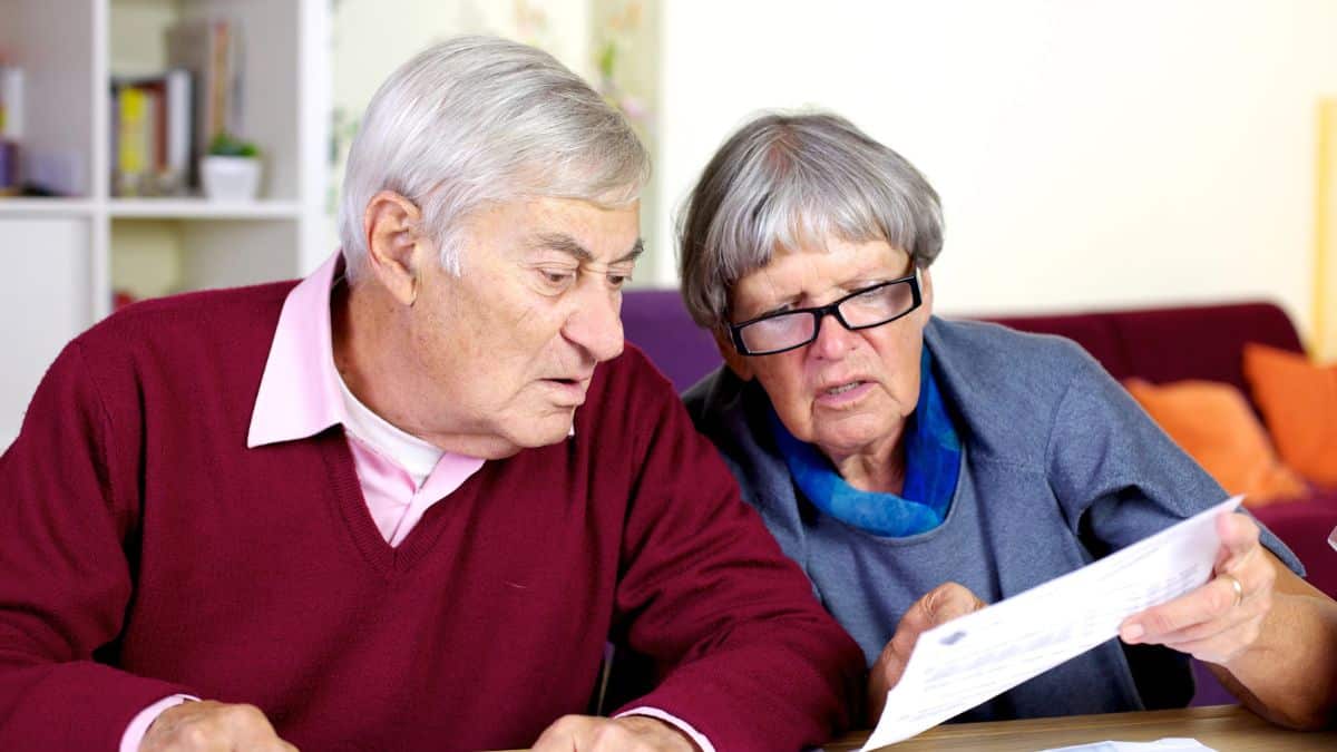 elder couple reviewing finances