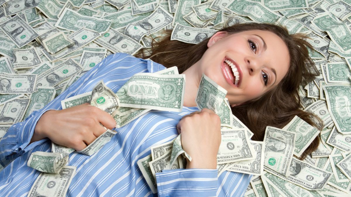 woman laying in cash