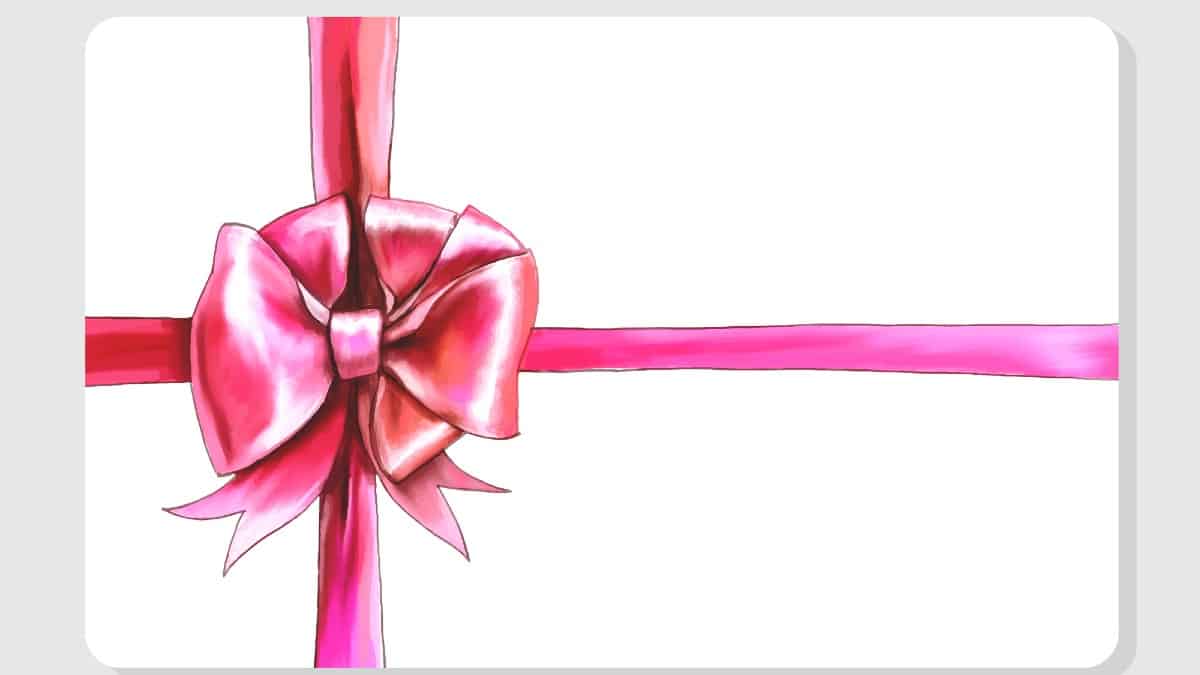 Card and pink bow with ribbons background with space for