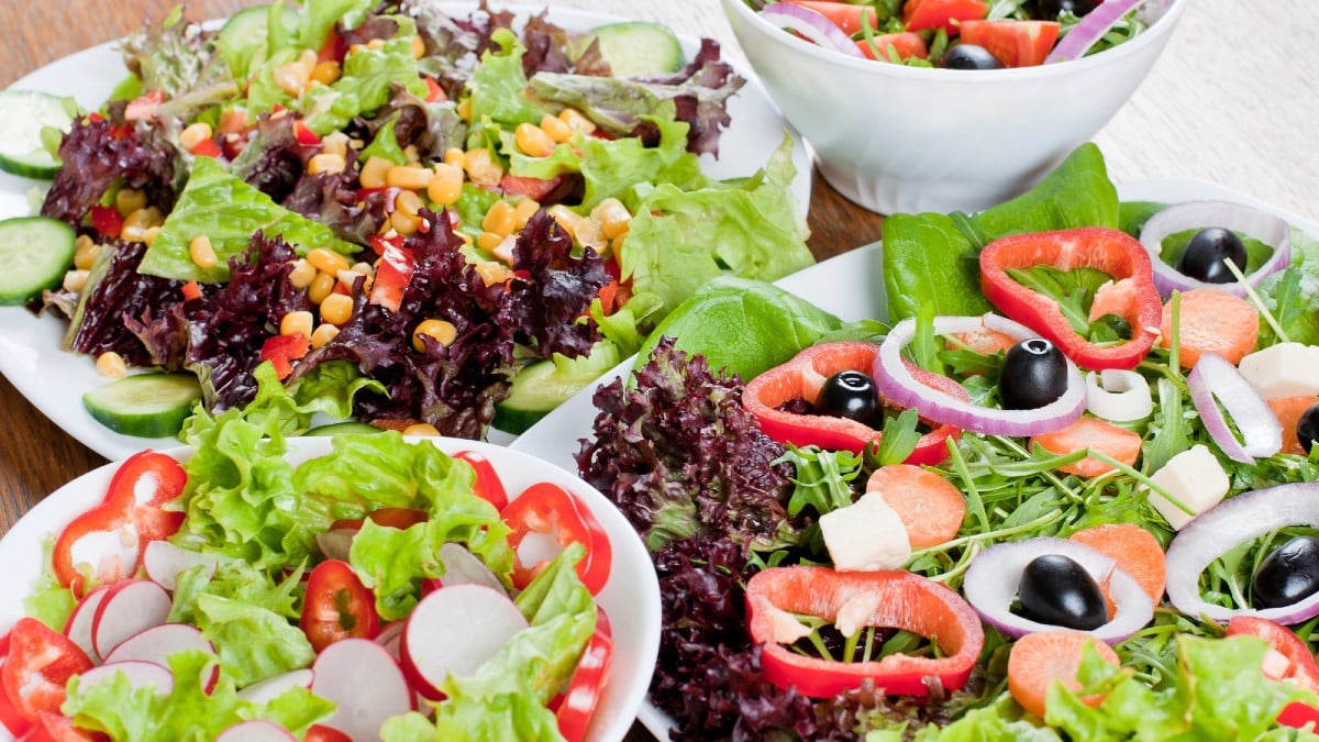 Healthy fresh salad setting on table