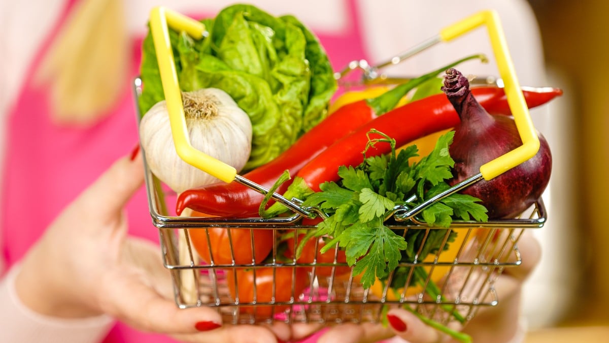 Shopping basket with many colorful vegetables. Healthy eating lifestyle,