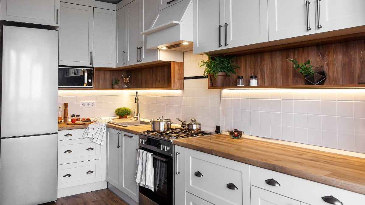 New Remove BG Save Share Sample New Stylish light gray kitchen interior with modern cabinets 