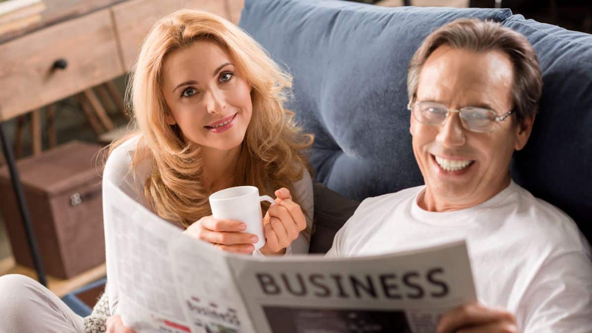 couple reading newspaper
