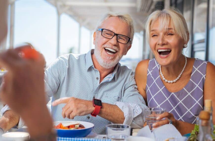 elder couple laughing