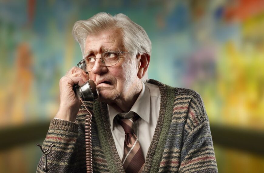 elder man sad on the phone