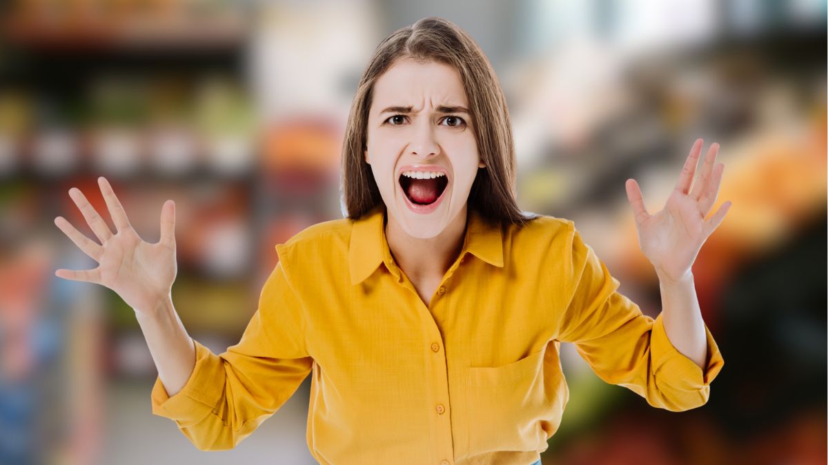 woman scared in grocery store
