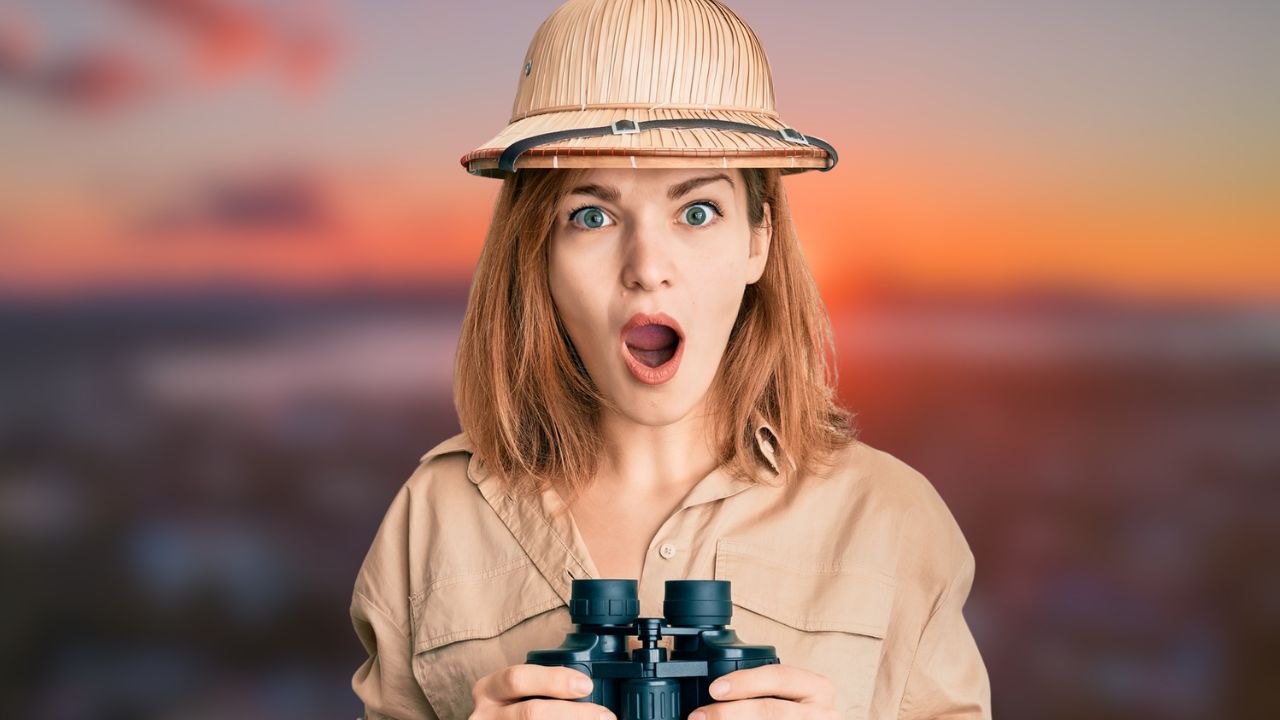woman shocked with binoculars
