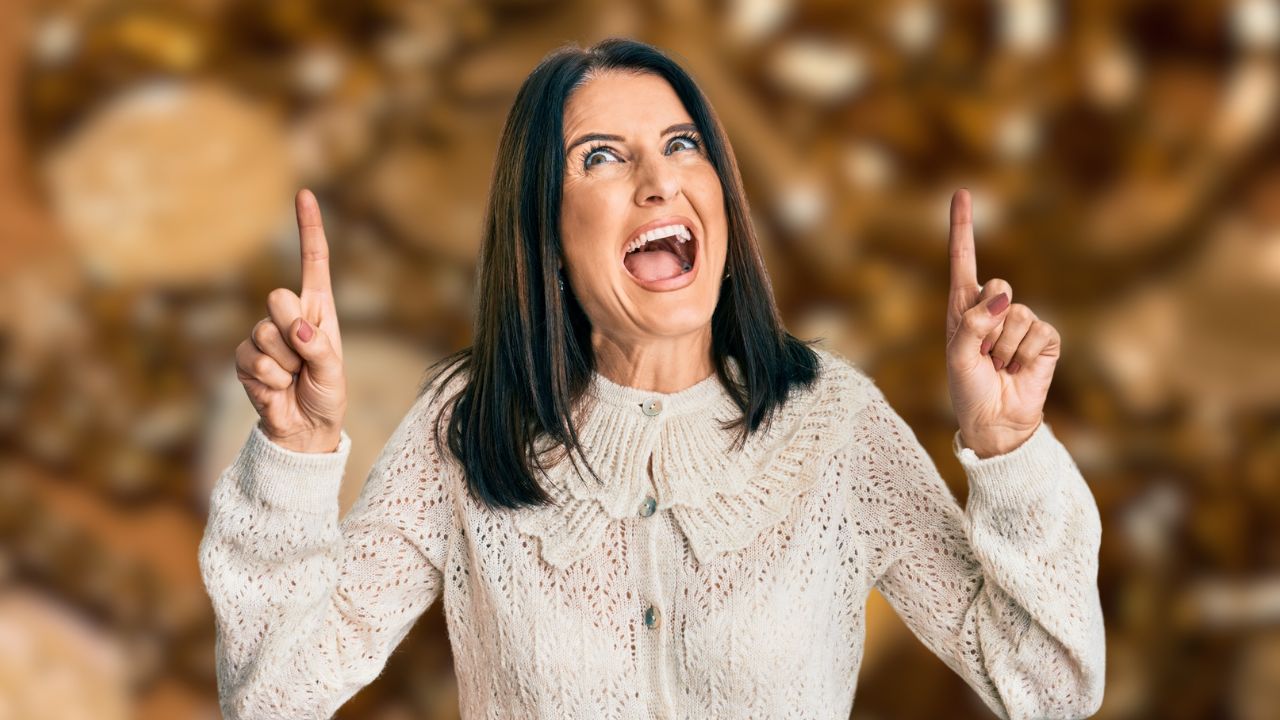 woman shouting about money and gold