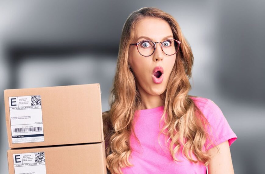 woman with boxes shocked