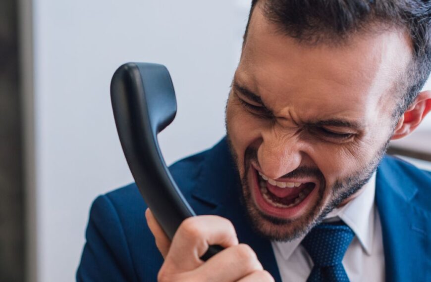 man shouting on the phone