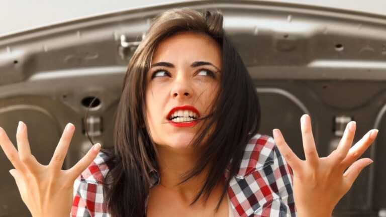 woman frustrated with car