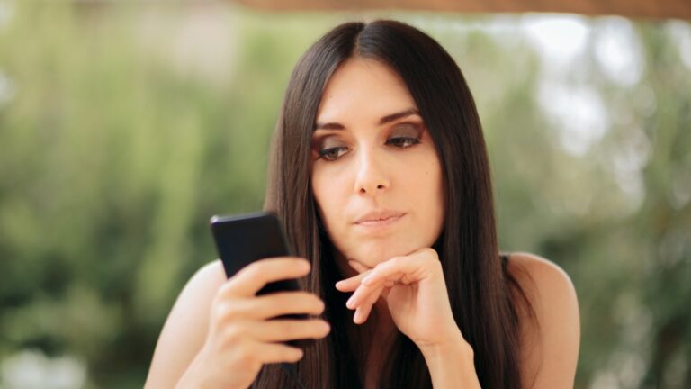 woman looking bored wearing black