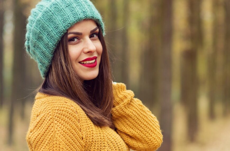 women with red lipstick in yellow sweeter